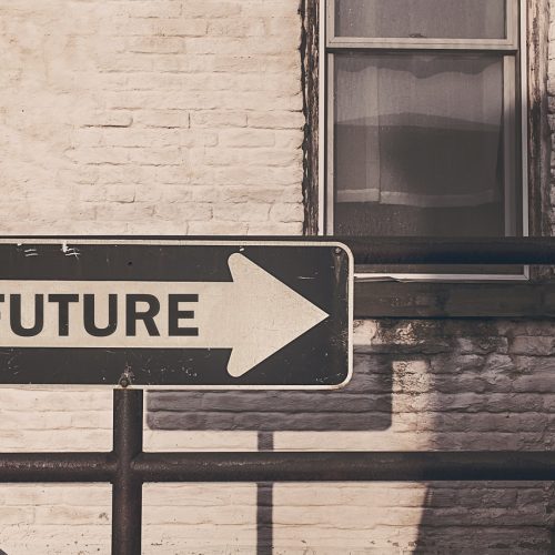Road sign with arrow with future written on it